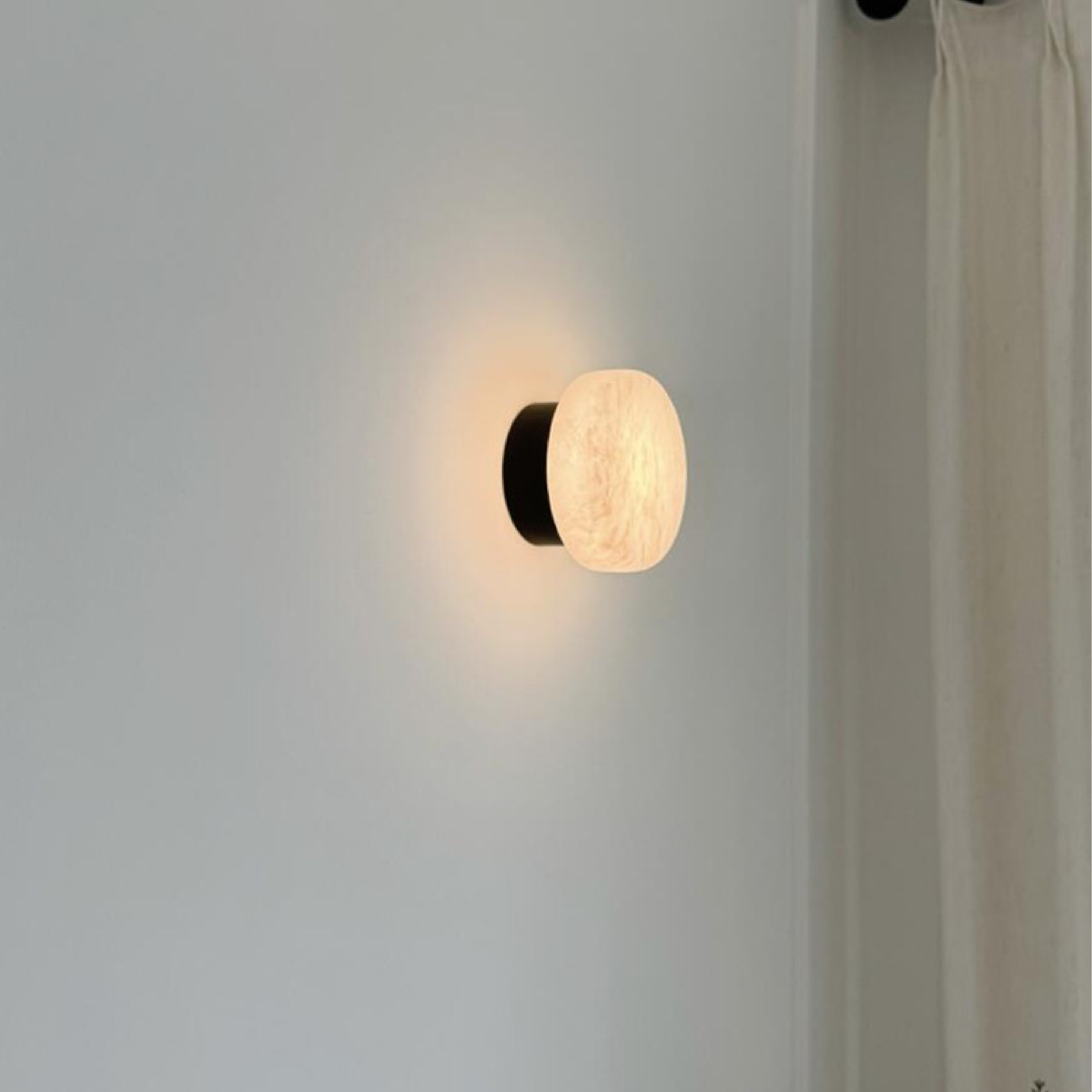 Marble wall sconce