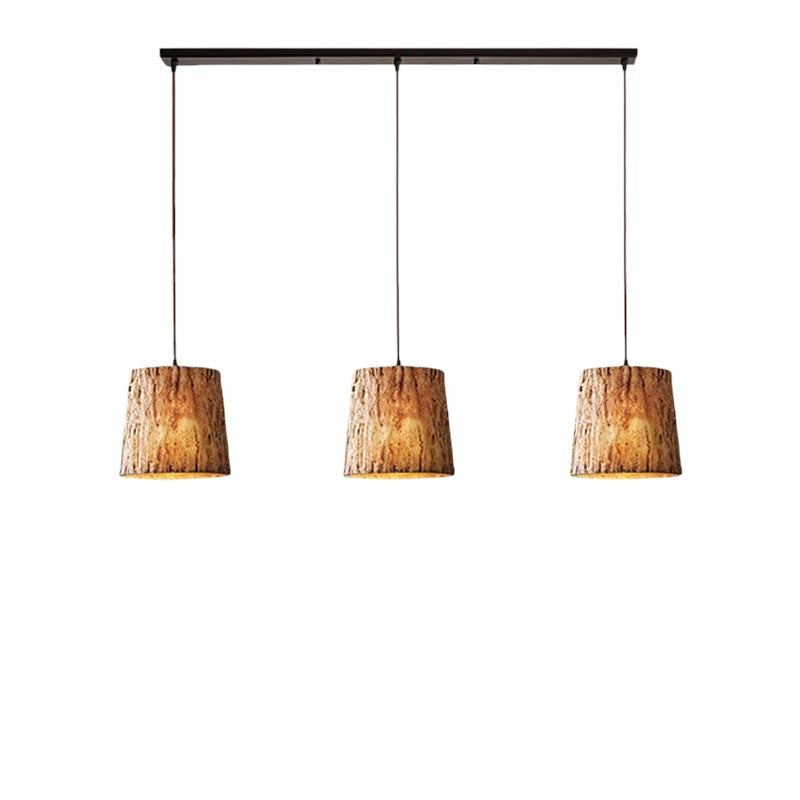 Pendant lamp made of wooden logs