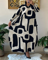 Victoria | The dress with long sleeves and print