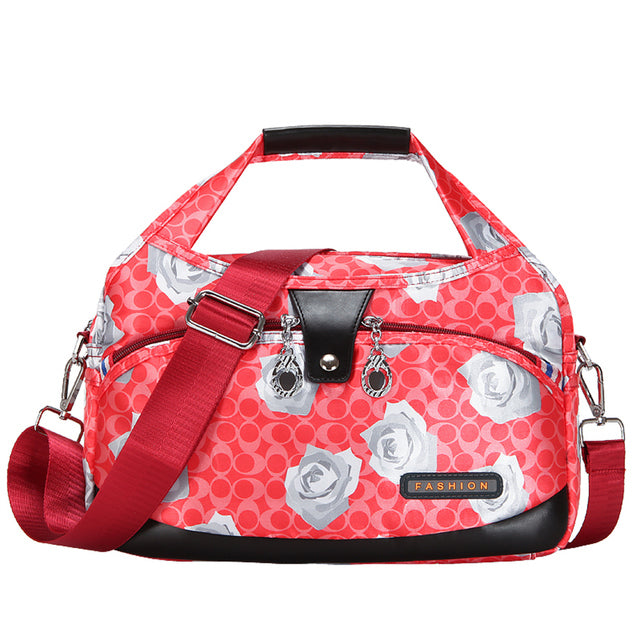 Sac à main WanderChic fleurs rouges avec rangement spacieux et style moderne pour femmes